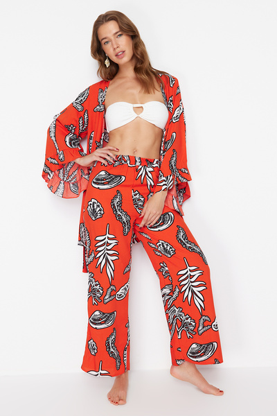 Trendyol Collection Tkané kalhoty s květinovým vzorem TBESS24PL00021