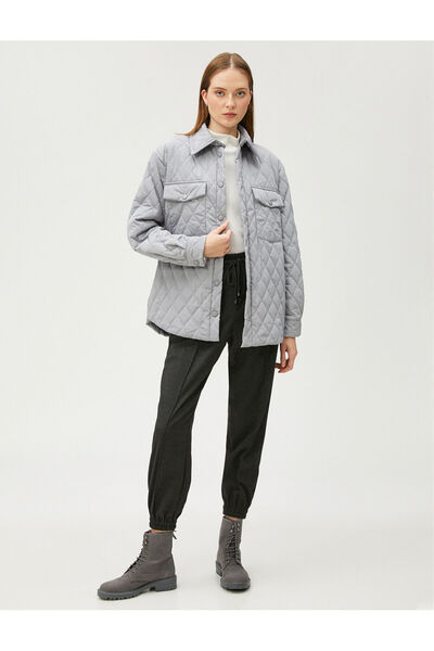 Koton Sahika Ercumen X Стьобана стьобана куртка з кишенями