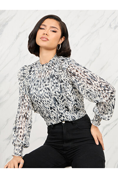 Styli كشكش التفاصيل بلوزة طباعة الفهد المعدنية