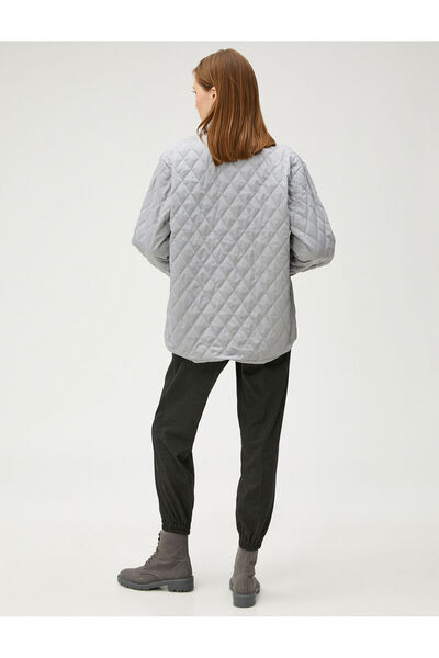 Koton Sahika Ercumen X Стьобана стьобана куртка з кишенями