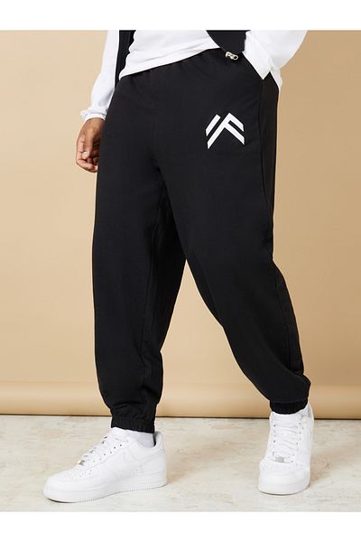 Styli Oversized Fit Jogger With Minimal Print & Elasticated Hem