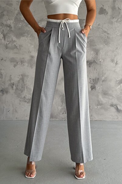 FEMELLE Kalhoty Palazzo PESTUDIO s bočním páskem na zip