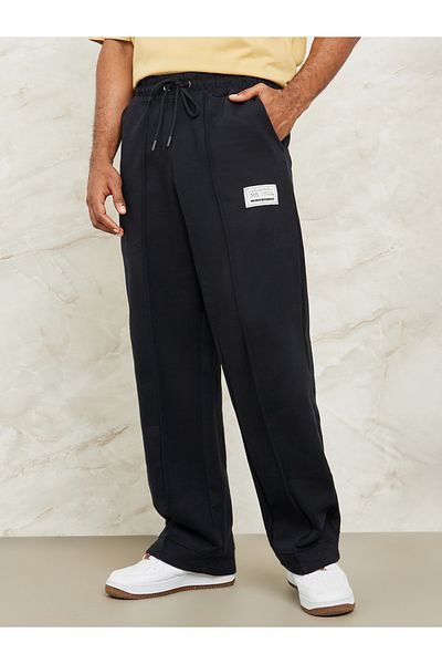 Styli Fleece Pintuck Wide Leg Jogger with Badge Detail