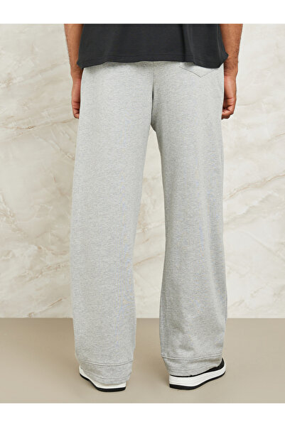 Styli Fleece Pintuck Wide Leg Jogger with Badge Detail