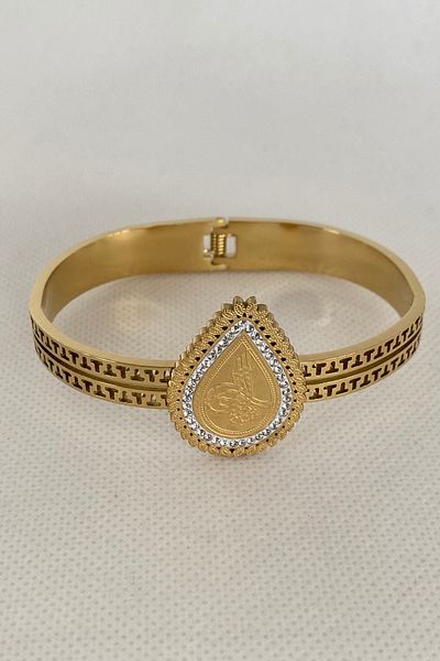 TAKIŞTIR أصفاد سوار على شكل طغراء ذهبية اللون