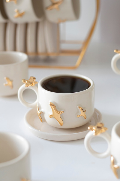 ada mia seramik كوب سيراميك مصنوع يدويًا بتصميم خاص مع شكل طائر ومزين بالذهب ...