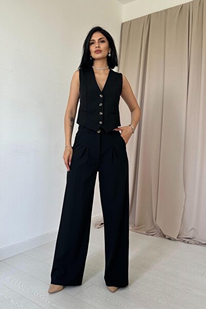 Essence Bouteille طقم سترة وبنطلون مع زخرفة من الخلف