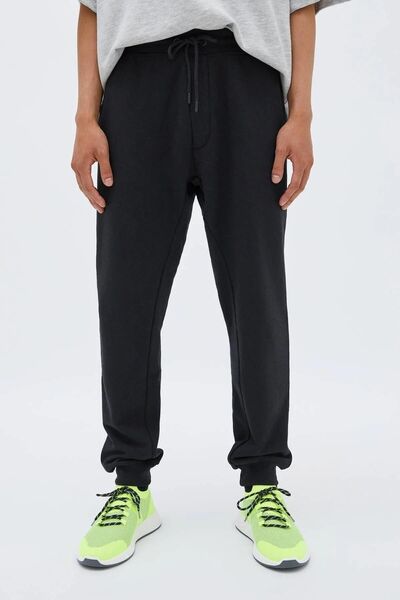 COMEOR Men's Black Back Pocket Label Detailed Elastic Leg Regular Fit Sweatpants