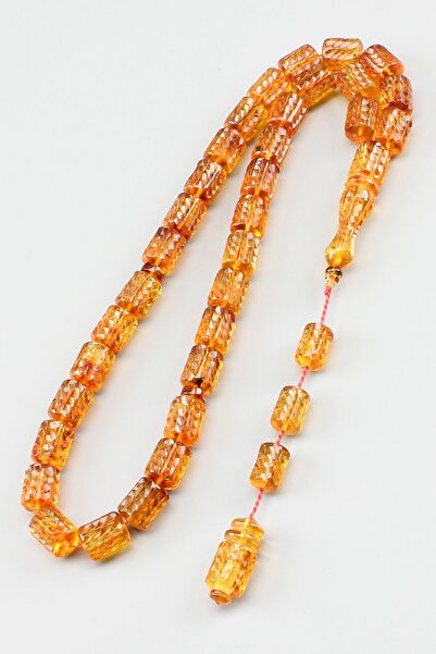 isfahantakı 8x10 mm 18 gram kalem işlemeli damla kehribar