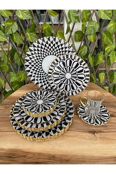 B&M 24 Piece Daisy Patterned Breakfast Set with Handles and Curves