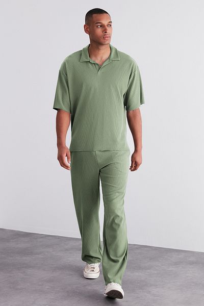 Trendyol Collection Limitierte Auflage - Mintfarbenes, weit geschnittenes, strukturiertes und knitterfreies Ottoman-Polo-T-Shirt TMNSS23PO00020