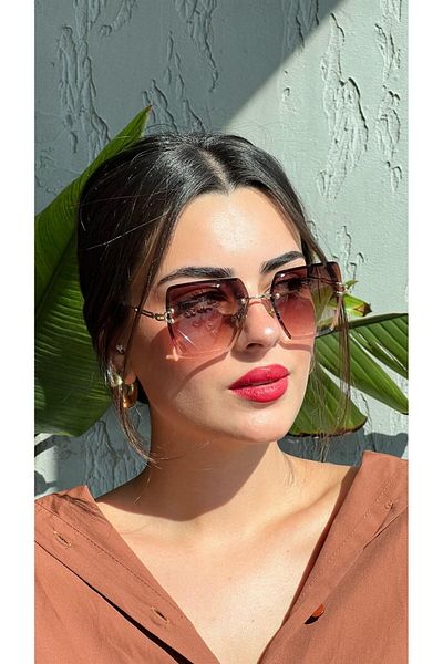 Della Pianto نظارة شمسية نسائية بلون بني كريستالي