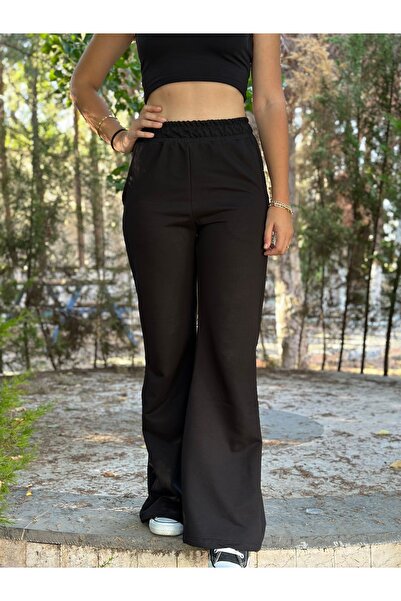 Vicuna Boutique Μαύρο φαρδύ παντελόνι φόρμας - Με τσέπες και με ελαστική μέση...