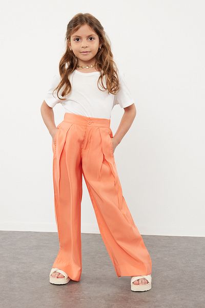 TRENDYOLKIDS Oranžové dámské dětské tkané kalhoty se širokými nohavicemi TKDSS24PL00008