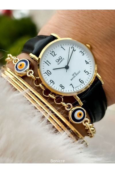 Q&Q Retro Brand Women's Wrist Watch with Black Leather Cord and Yellow Case