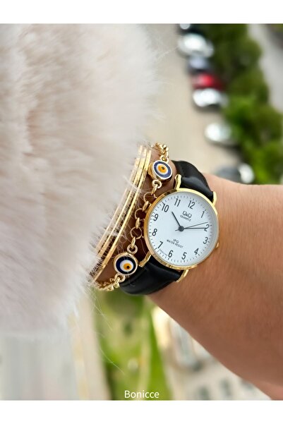 Q&Q Retro Brand Women's Wrist Watch with Black Leather Cord and Yellow Case