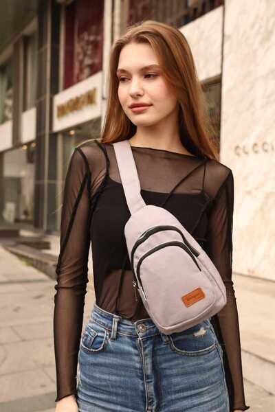 KIRASE Μια ποιοτική πάνινη πλεκτή τσάντα ώμου και στήθους με φερμουάρ με λουράκι