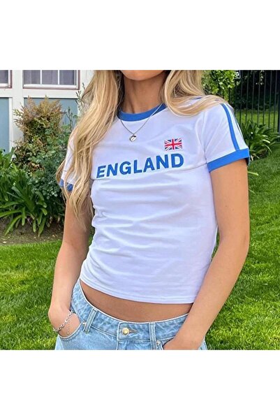 Toum بلوزة قصيرة بيضاء مطبوعة من إنجلترا - أزياء دومبوليري، مضلعة