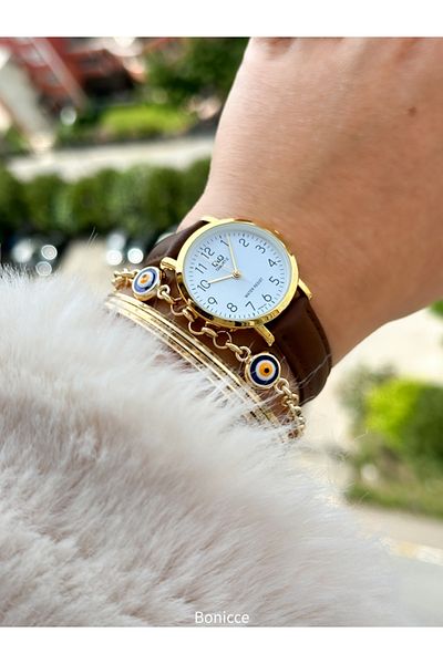 Q&Q Retro Brand Leather Corded Gold Case Women's Wristwatch and Bracelet - Polite with Numerals