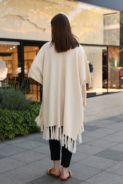 ALCHON V-Neck Short Sleeve Skirt with Tassels Solid Color Side Stitching Midi Length Knitwear Shawl Look Poncho