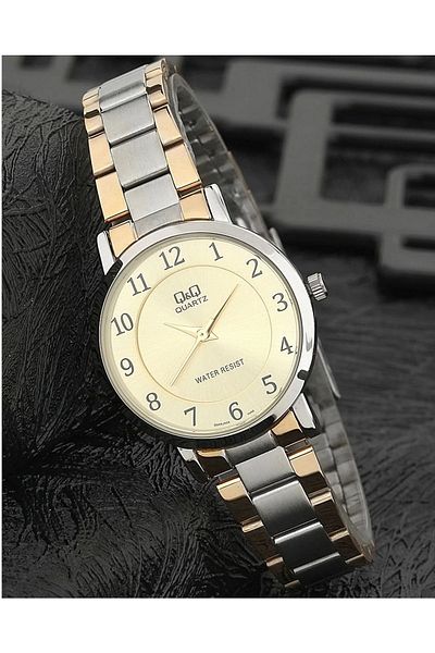 Q&Q Women's Silver Color Classic Numeral Wristwatch