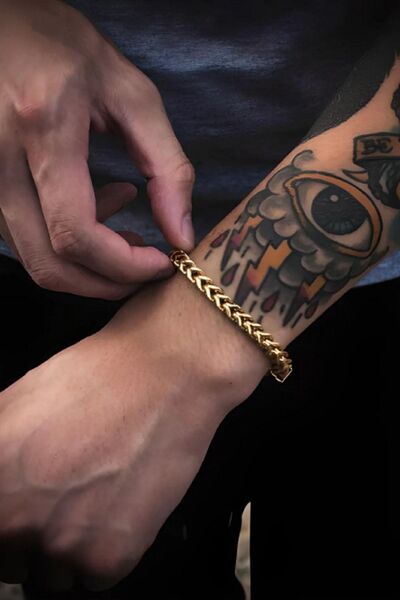 TREND COLLECTİON سوار من الفولاذ المقاوم للتشوه باللون الذهبي للجنسين موديل ك...