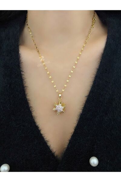 SERAMOR قلادة ندفة الثلج من الفولاذ باللون الوردي