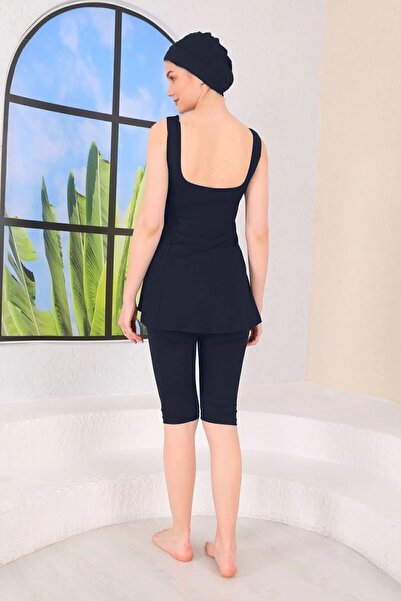 medipek Sötétkék félig zárt pántos harisnya fürdőruha - darabos ruha