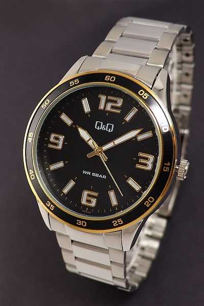 Q&Q Quartz Original Men's Wrist Watch with Steel Cord