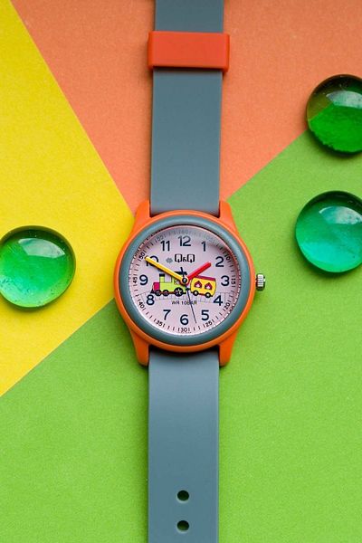 Q&Q Gray Orange Waterproof Boy's Wristwatch with Numerals