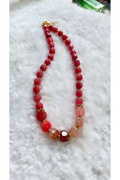 Takkı by Handan Pembe kuvars tasarım kolye.