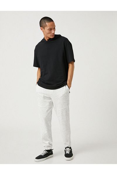 Koton Basic-Jogginghose mit Reißverschlusstasche an der Taille und Spitze