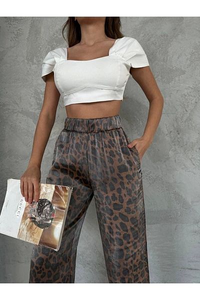 timagna Shiny fabric leopard print trousers