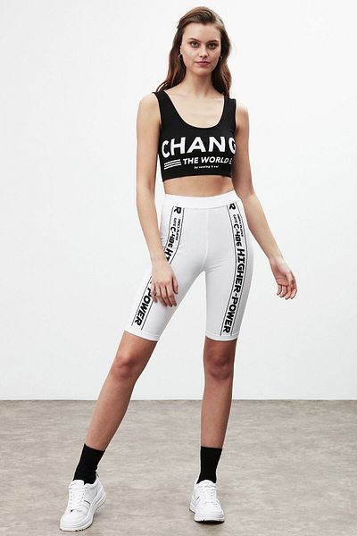 GRIMELANGE Leggings albi slim fit sport peste genunchi cu imprimeu cu slogan Force pentru femei