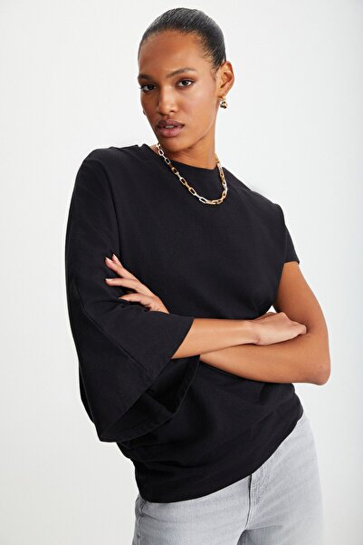 GRIMELANGE Jednobarevné černé tričko asymetrického střihu - krátký rukáv, výstřih