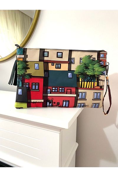 TALKING DREAMS Green house patterned clutch