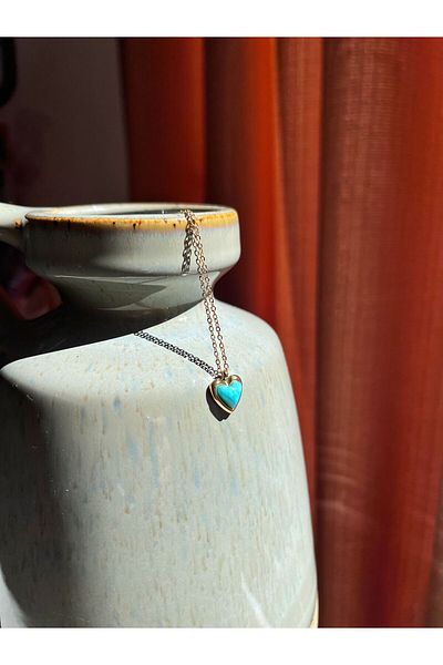 Miltonia Heart Shaped Blue Steel Necklace