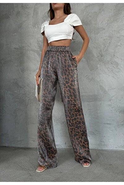 timagna Shiny fabric leopard print trousers