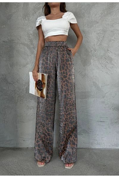 timagna Shiny fabric leopard print trousers
