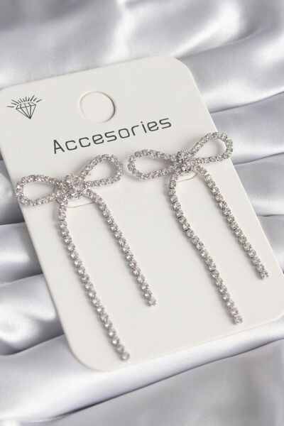 shinecollection sallanan küpe fiyonk kurdele küpe