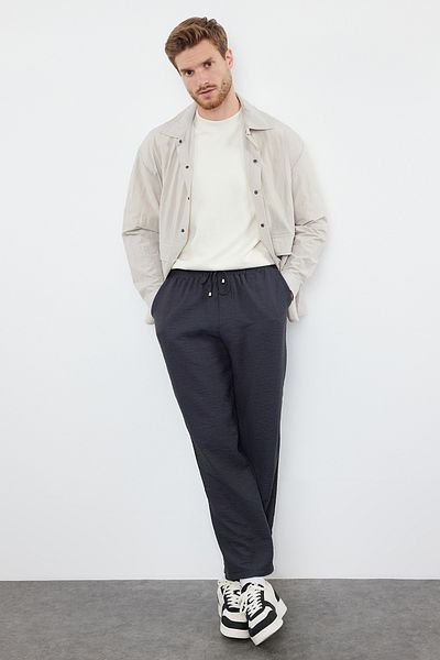 Trendyol Collection Anthrazitfarbene, gewölbte Hose mit elastischem Bund und Leinenoptik TMNSS20PL0547