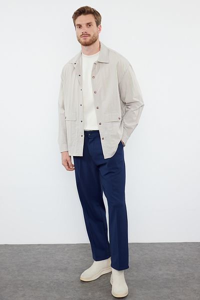 Trendyol Collection Sötétkék, bő szabású, hajtogatott szövetnadrág - TMNSS24PL00024
