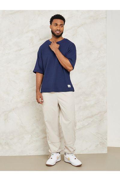 Styli Waffle Knit Oversized T-Shirt with Turn Up Sleeve