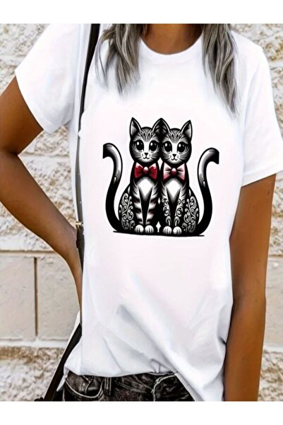 CLASSY.MODA قميص تيشرت سوبريم للنساء - أبيض مطبوع قصة فضفاضة برقبة دائرية وأك...