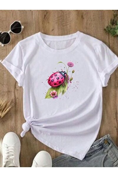 CLASSY.MODA قميص تيشرت سوبريم للنساء - أبيض مطبوع قصة فضفاضة برقبة دائرية وأك...