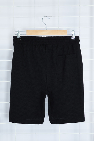 Kolekcia Trendyol Textúrované čierne waffle šortky – elastická šnúrka v páse, Slim Fit TMNSS24SR00029