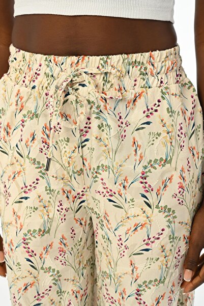 Orfeo Negro Γυναικείο παντελόνι με φλοράλ σχέδιο - Ελαστική μέση, φαρδύ πόδι