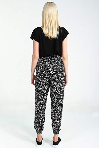 Collezione Μαύρο γυναικείο παντελόνι με φλοράλ σχέδιο