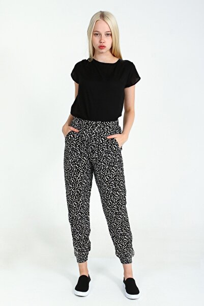 Collezione Μαύρο γυναικείο παντελόνι με φλοράλ σχέδιο