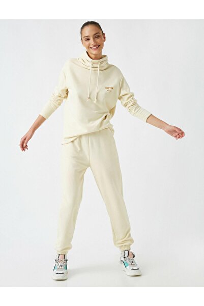 Koton بنطال رياضي نسائي من القطن العضوي ريسبكت لايف